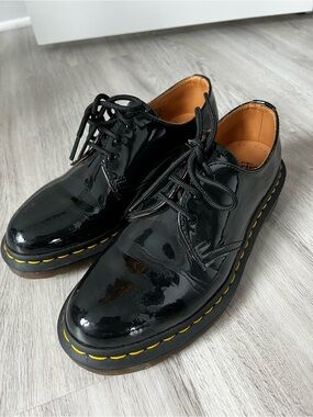 Dr. Martens Black Patent Leather Sneakers with Yellow Stitching